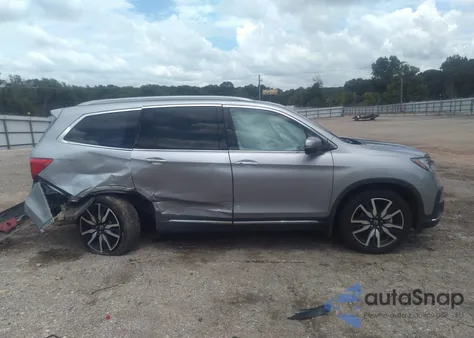 2020 Honda Pilot 2Wd Touring 8 Passenger from USA, damaged, VIN 5FNYF5H9XLB019372
